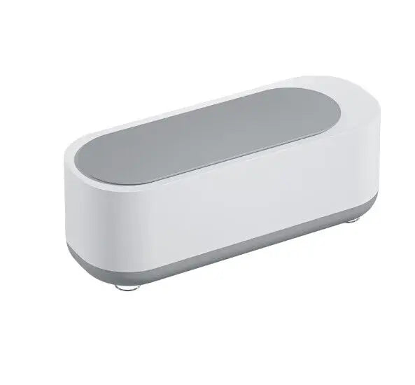 Nettoyeur à ultrasons compact CleanWave Mini vu de profil, coloris blanc et gris